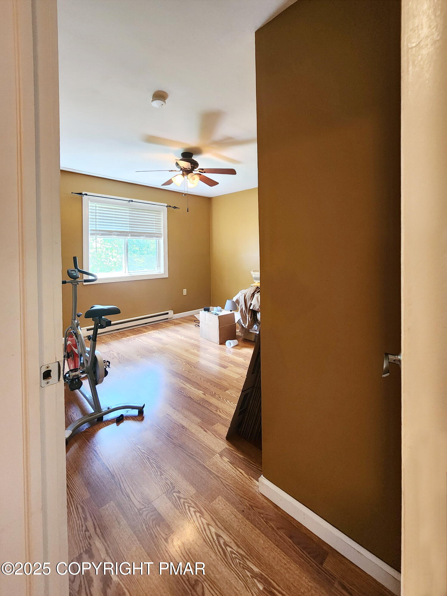 1152 Steele Circle Bushkill, PA 18324 - Photo 8 of 15 a view of a living room with a wooden floor