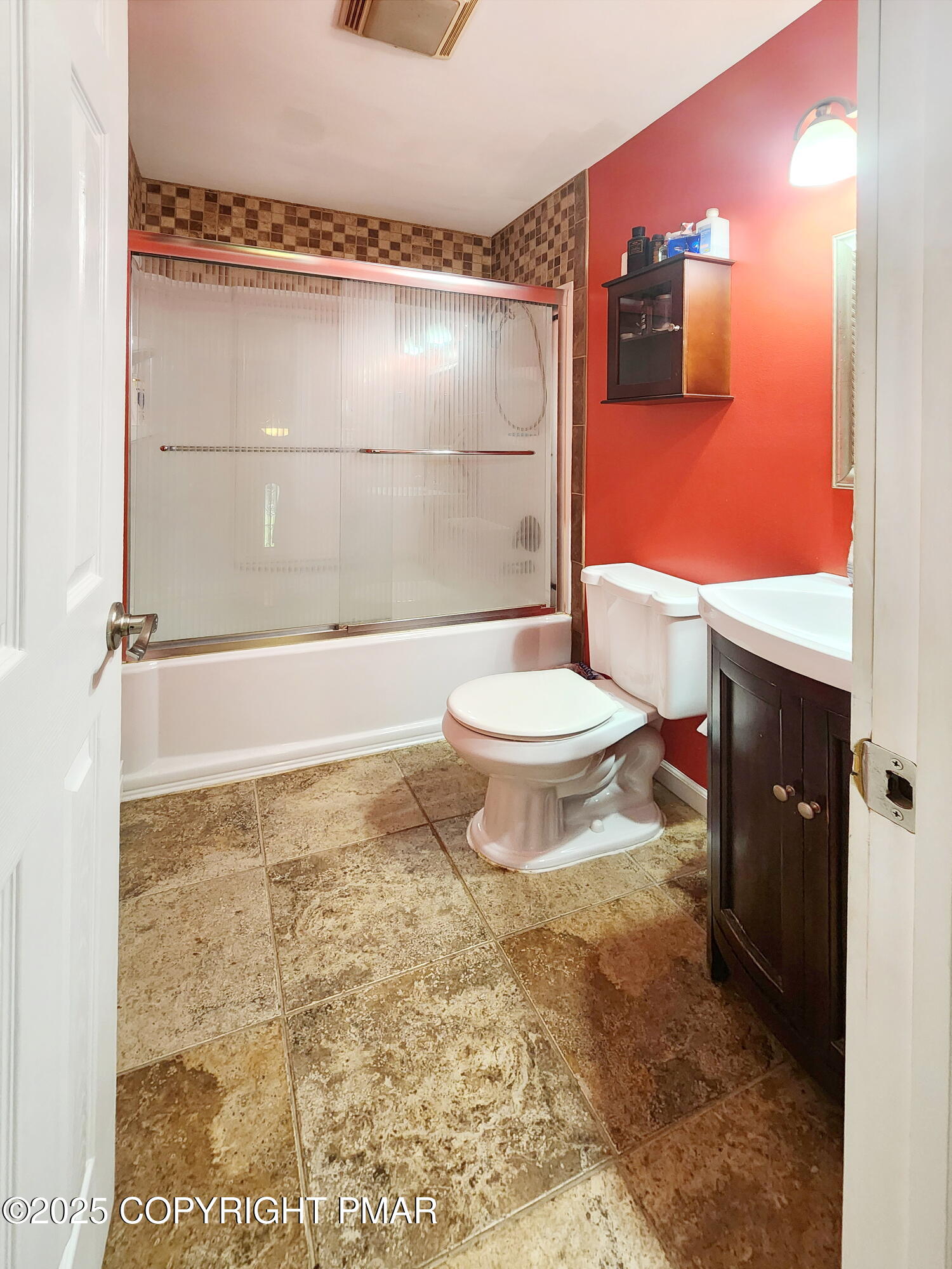 1152 Steele Circle Bushkill, PA 18324 - Photo 9 of 15 a bathroom with a granite countertop sink toilet and shower