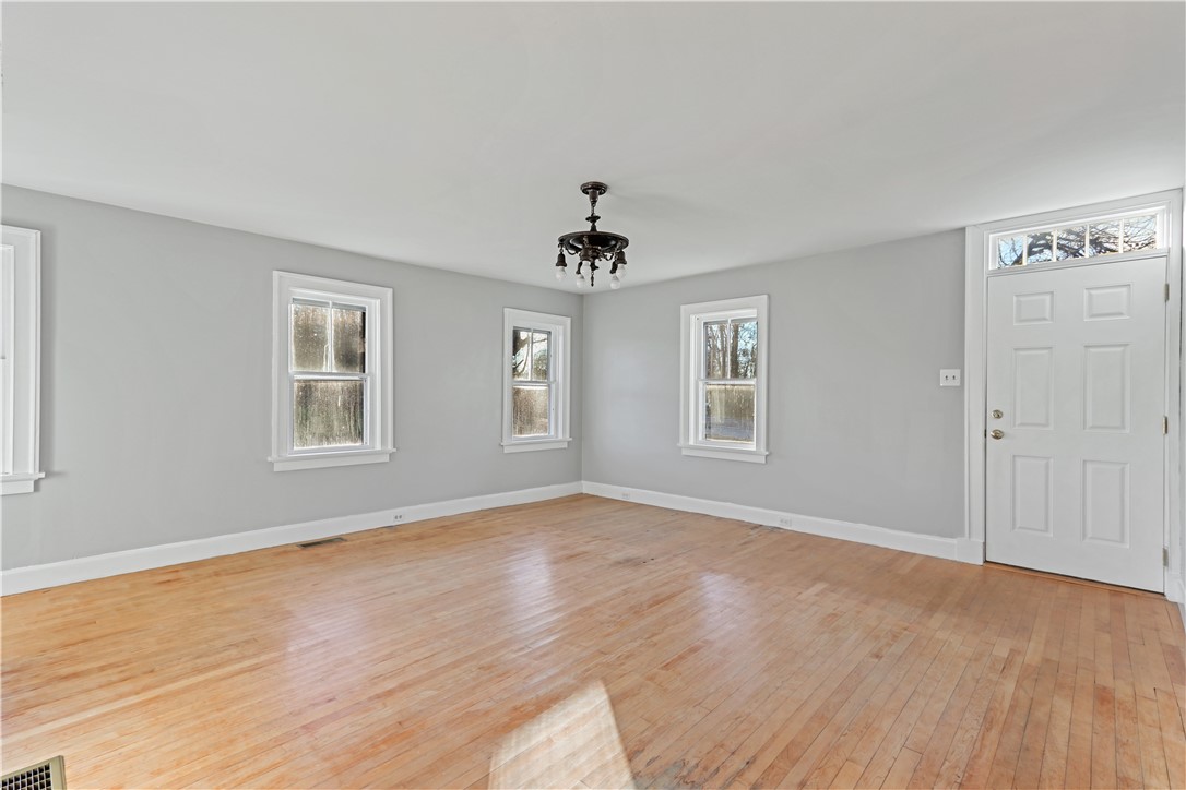 4502 Main Road Tiverton, RI 02878 - Photo 11 of 43 front door leads into family room