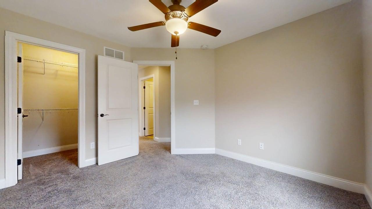 1320 Myrtle Beach Avenue Champaign, IL 61822 - Photo 22 of 29 a view of empty room with window and ceiling fan