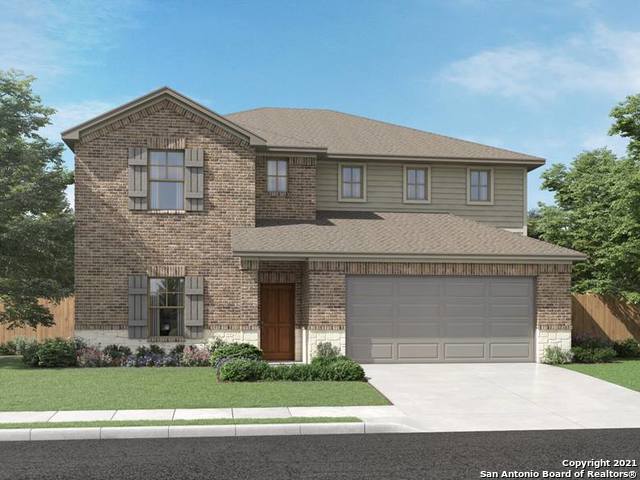2410 Pitcher Ranch San Antonio, TX 78253 - Photo 1 of 1 a front view of a house with a garden