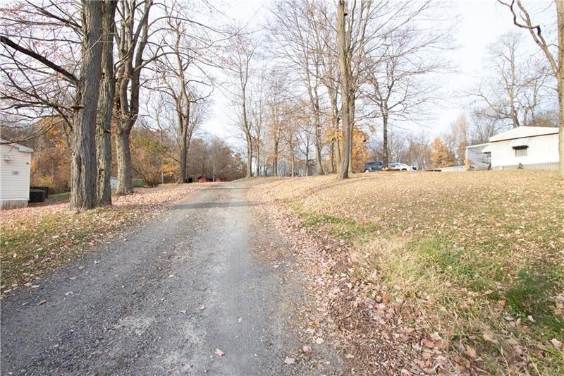 695 Shaffer Road Hookstown, PA 15050 - Photo 11 of 26 a street view covered with snow