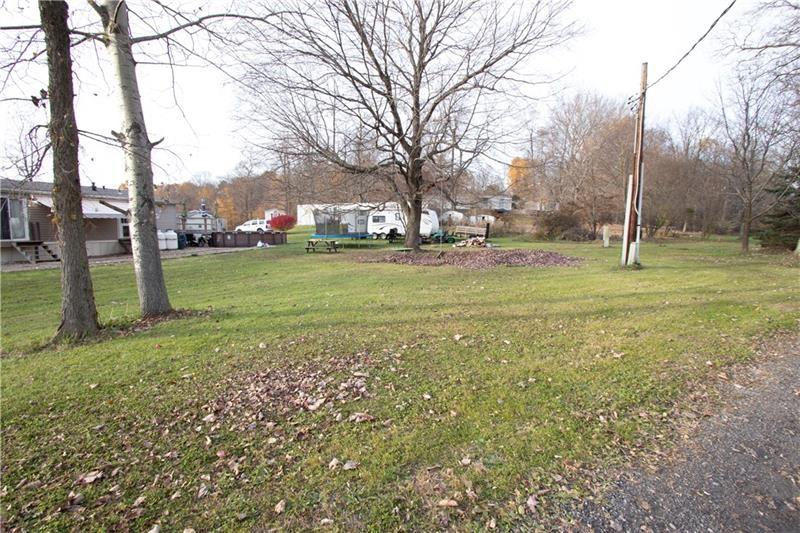 695 Shaffer Road Hookstown, PA 15050 - Photo 17 of 26 a view of a field with a tree