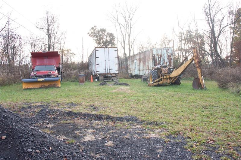 695 Shaffer Road Hookstown, PA 15050 - Photo 6 of 26 a view of a backyard with large trees