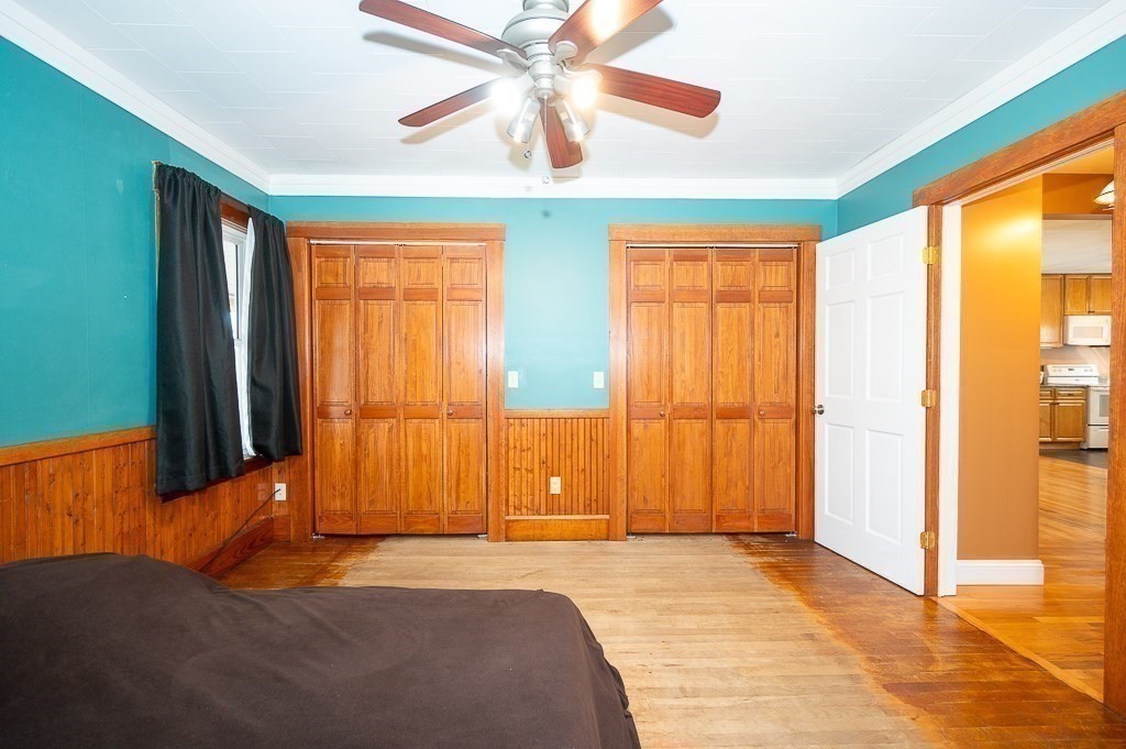134 Baker Street Gardner, MA 01440 - Photo 12 of 42 a bedroom with a bed and a window