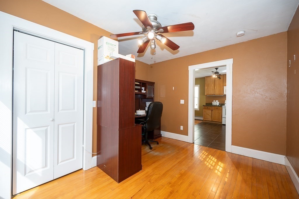 134 Baker Street Gardner, MA 01440 - Photo 15 of 42 a view of a room with cabinet and wooden floor