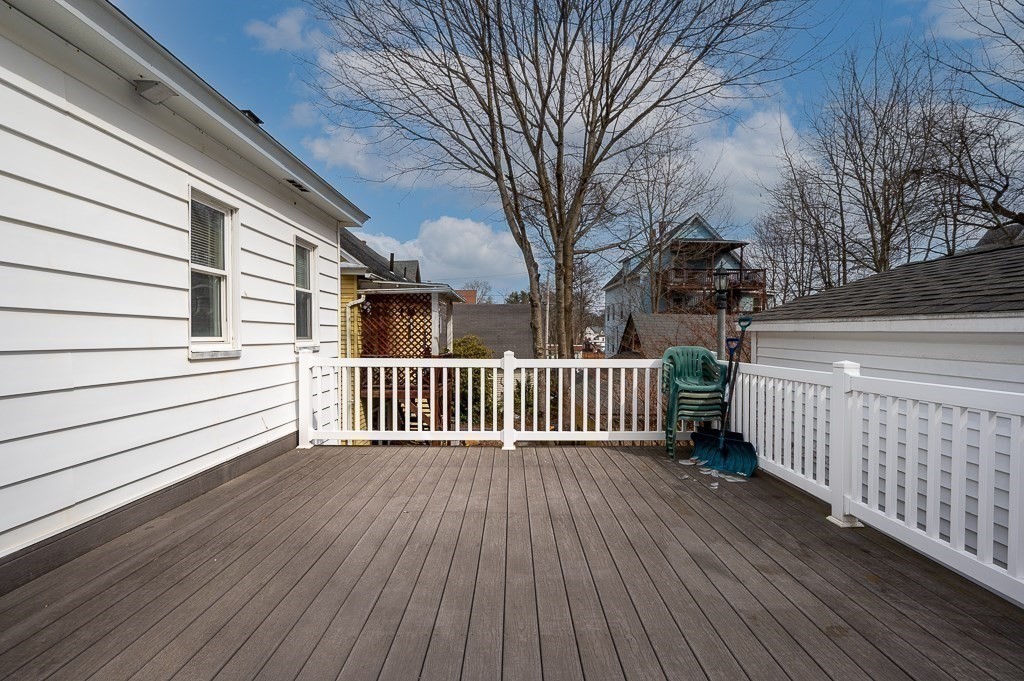 134 Baker Street Gardner, MA 01440 - Photo 17 of 42 a view of deck with wooden floor and fence
