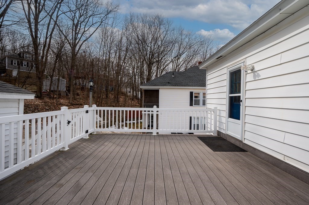 134 Baker Street Gardner, MA 01440 - Photo 18 of 42 a view of a wooden deck