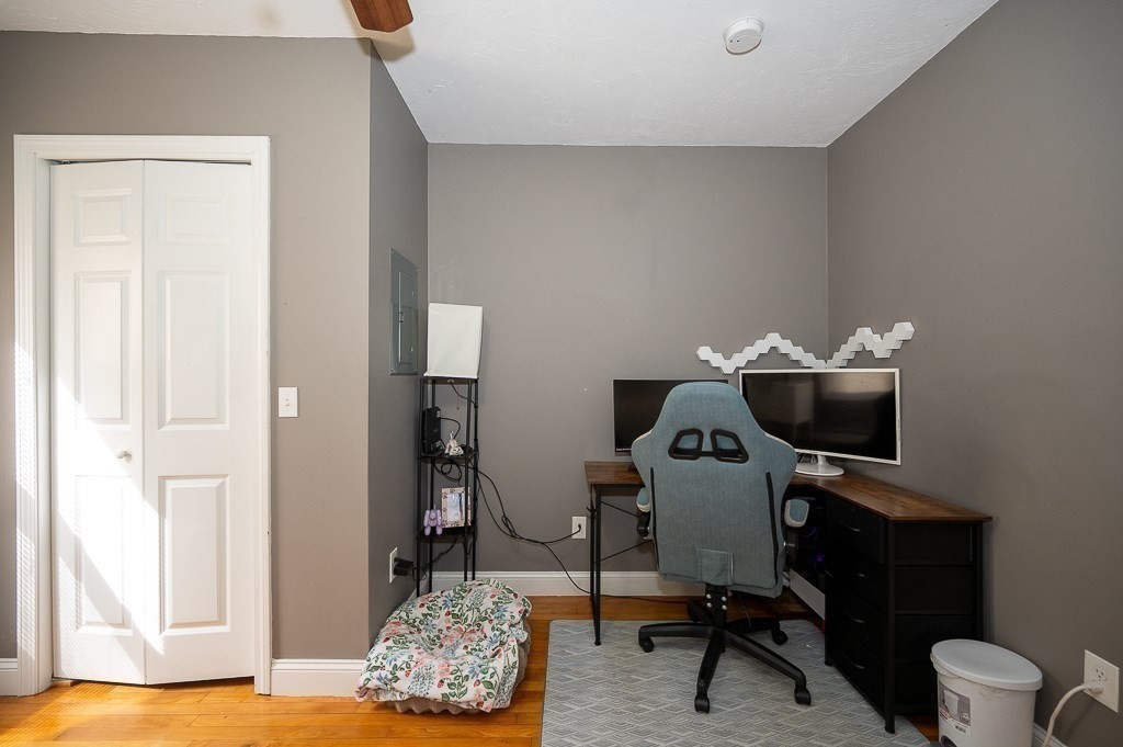 134 Baker Street Gardner, MA 01440 - Photo 23 of 42 a workspace with furniture and a window