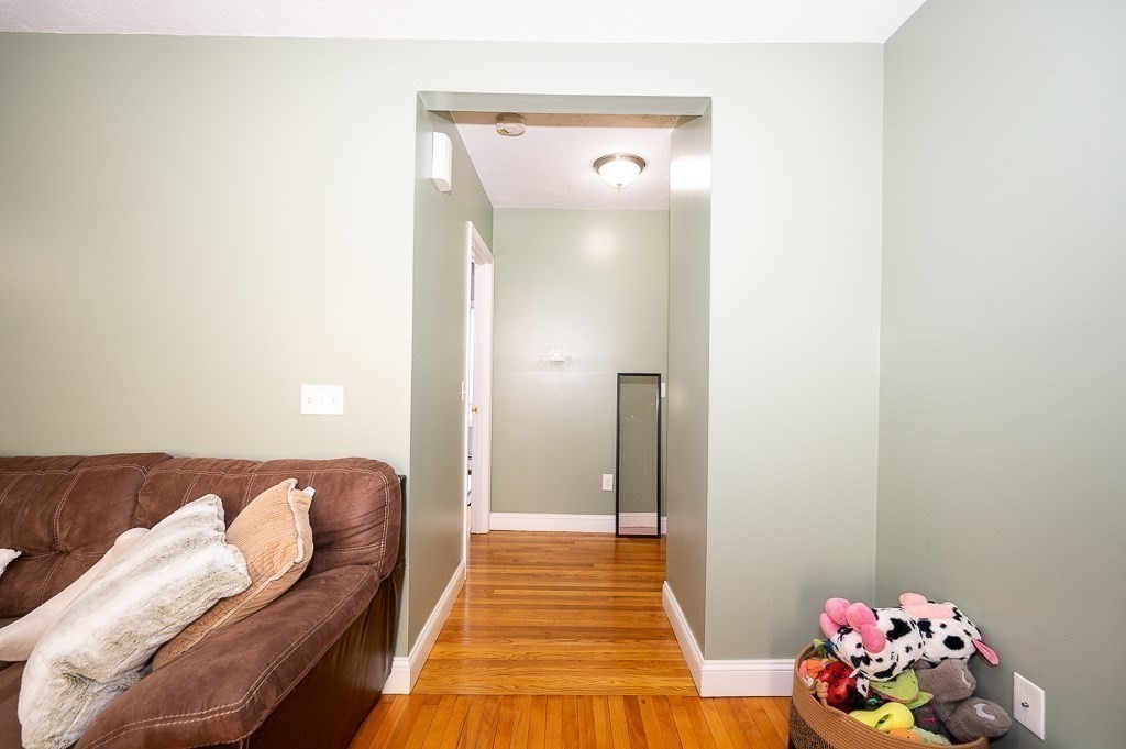 134 Baker Street Gardner, MA 01440 - Photo 30 of 42 a bedroom with a bed and hallway