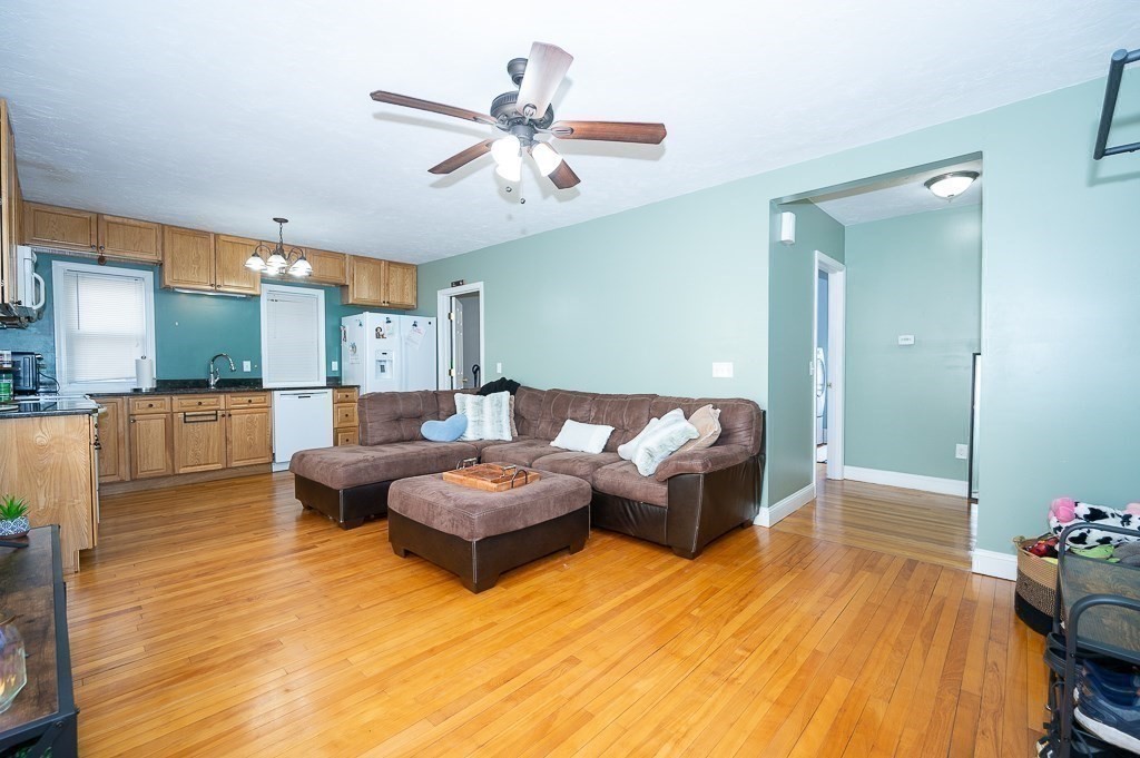 134 Baker Street Gardner, MA 01440 - Photo 31 of 42 a living room with furniture and flowers