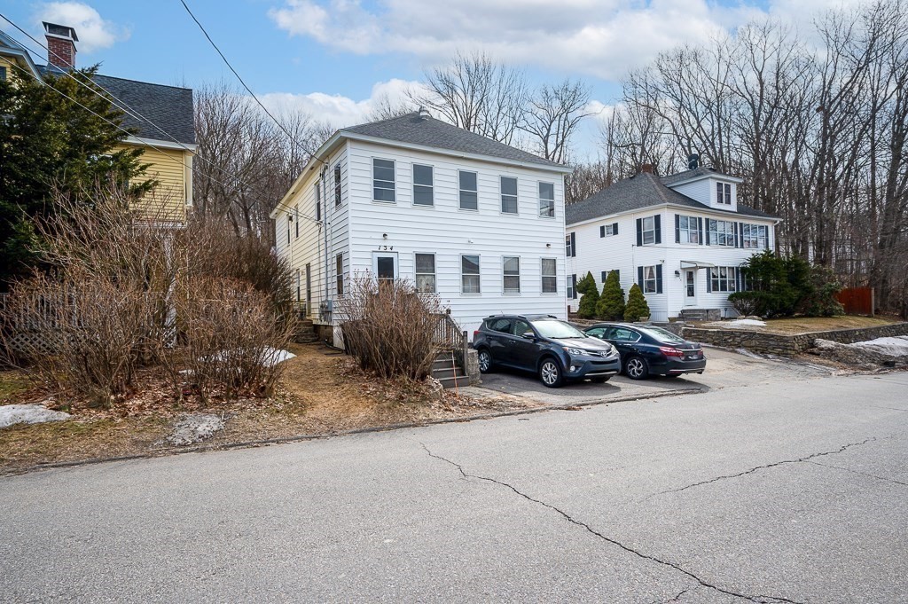 134 Baker Street Gardner, MA 01440 - Photo 37 of 42 a view of a car park in front of house