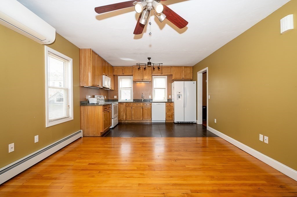 134 Baker Street Gardner, MA 01440 - Photo 5 of 42 a view of an empty room with a window