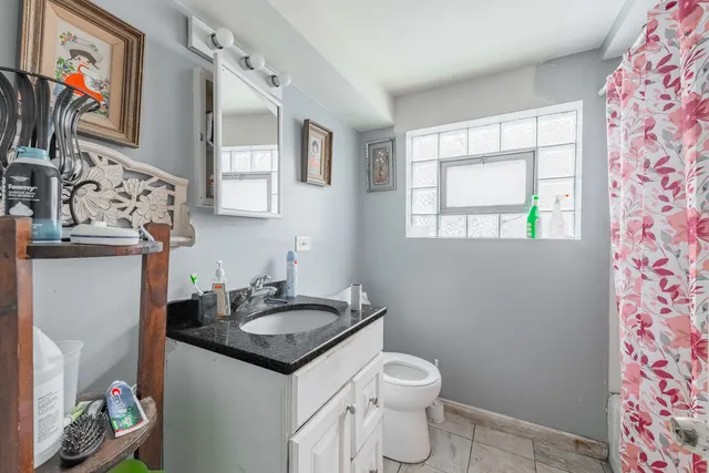 a bathroom with a sink and a toilet