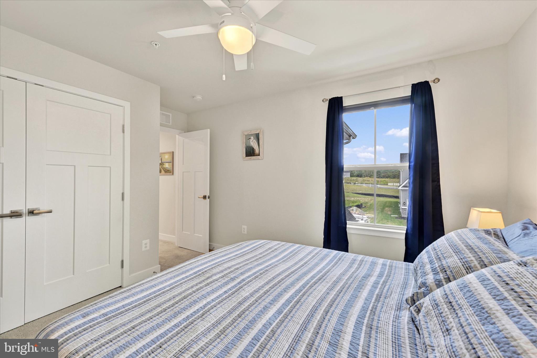 933 Swilken Bridge Road Aberdeen, MD 21001 - Photo 24 of 37 a bedroom with a bed and a large window