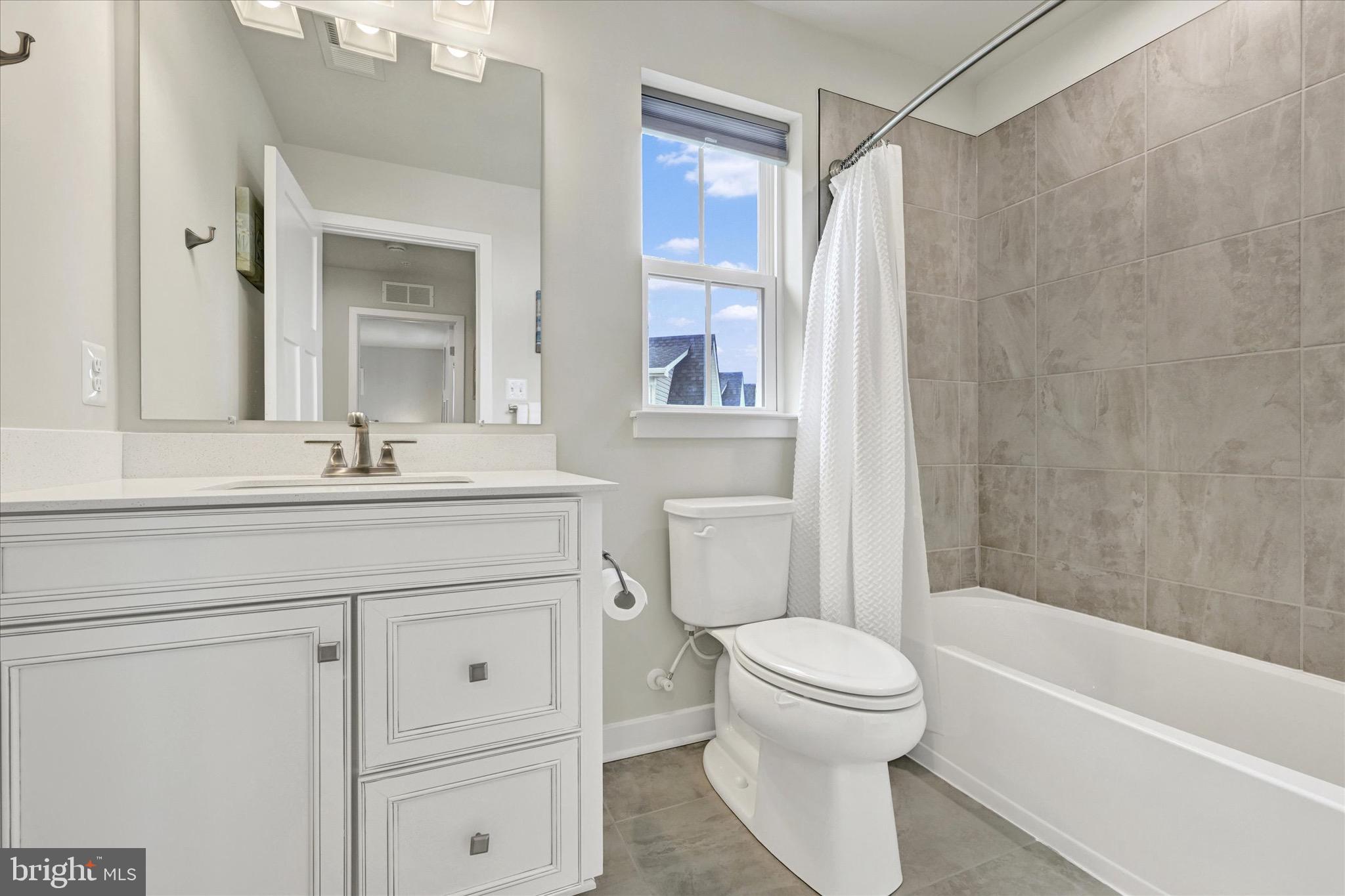 933 Swilken Bridge Road Aberdeen, MD 21001 - Photo 28 of 37 a bathroom with a sink toilet and shower