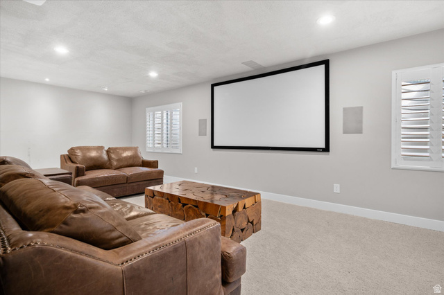 3359 Eurasian Crane Road Clinton, UT 84015 - Photo 42 of 71 Carpeted cinema featuring a textured ceiling and recessed lighting