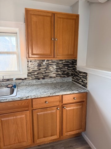2 West 10th Street, Unit 2 Lowell, MA 01850 - Photo 2 of 13 a bathroom with a sink and a mirror