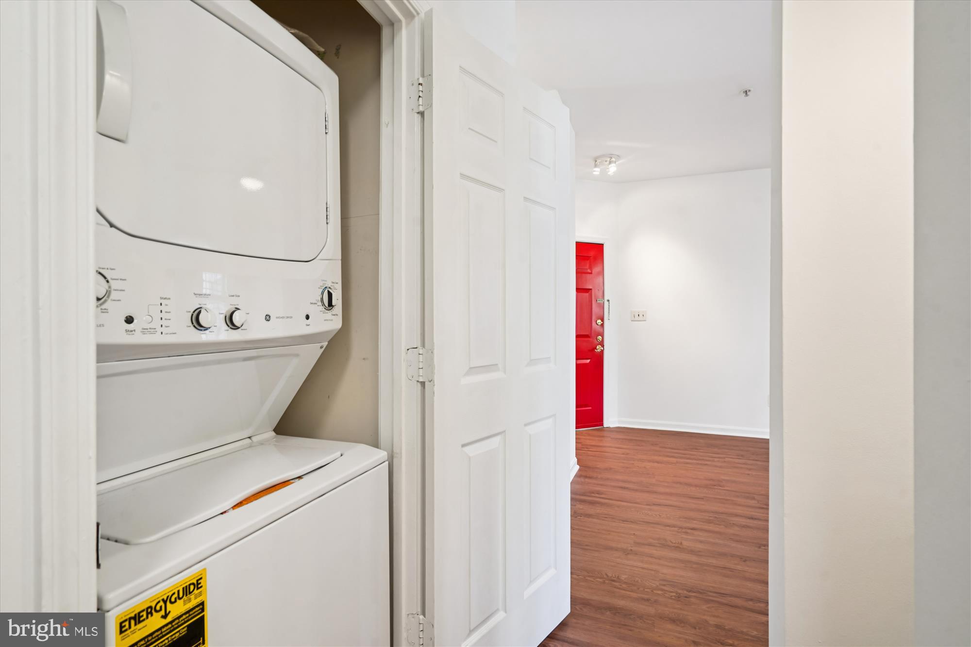 1314 Garden Wall Circle, Unit C Reston, VA 20194 - Photo 16 of 26 a utility room with dryer and washer
