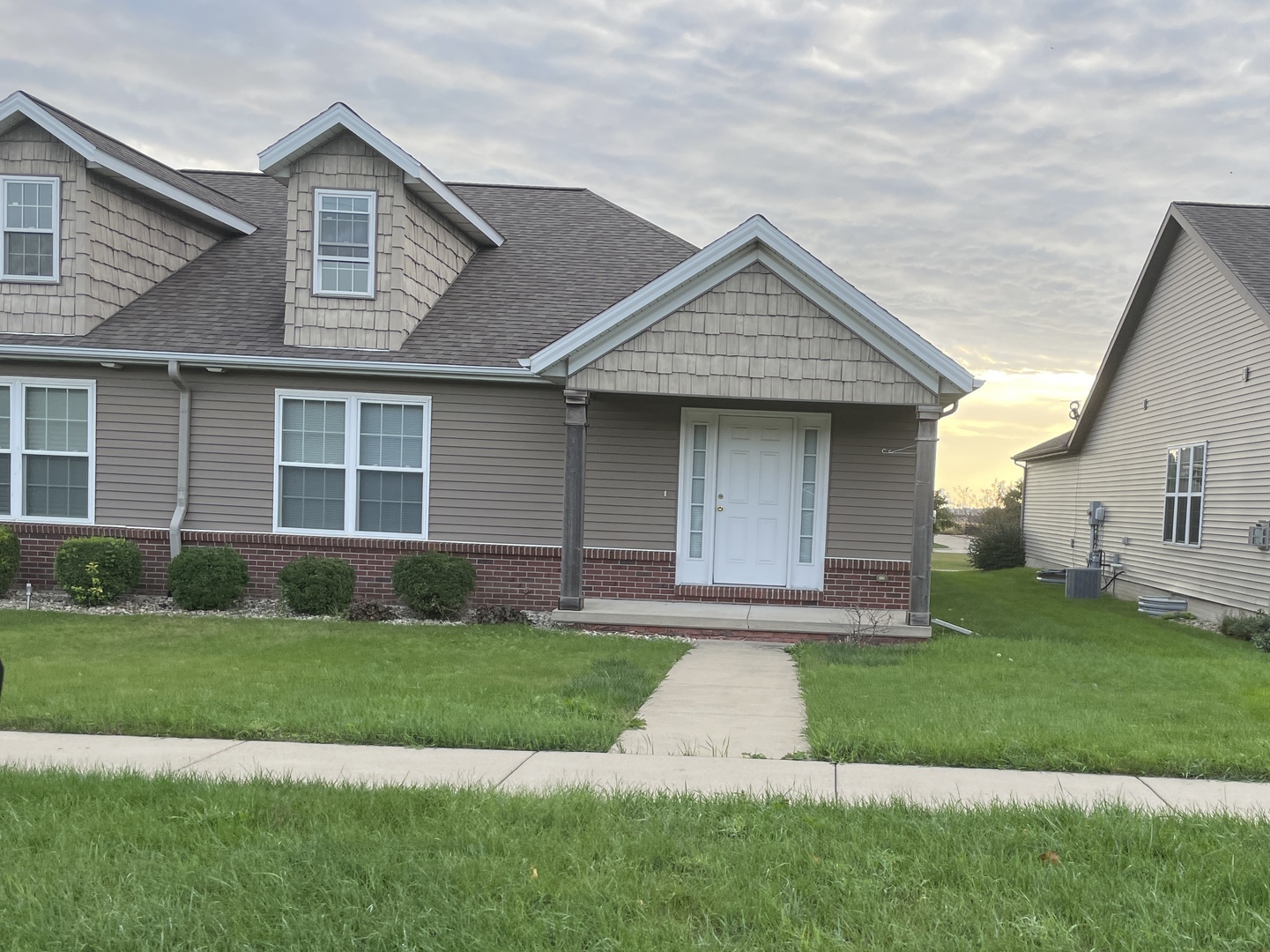 1647 Belclare Road Normal, IL 61761 - Photo 1 of 1 a front view of a house with a yard and garage