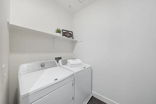 a view of a room with wooden walls