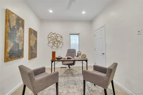 a bedroom with a bed and cabinets