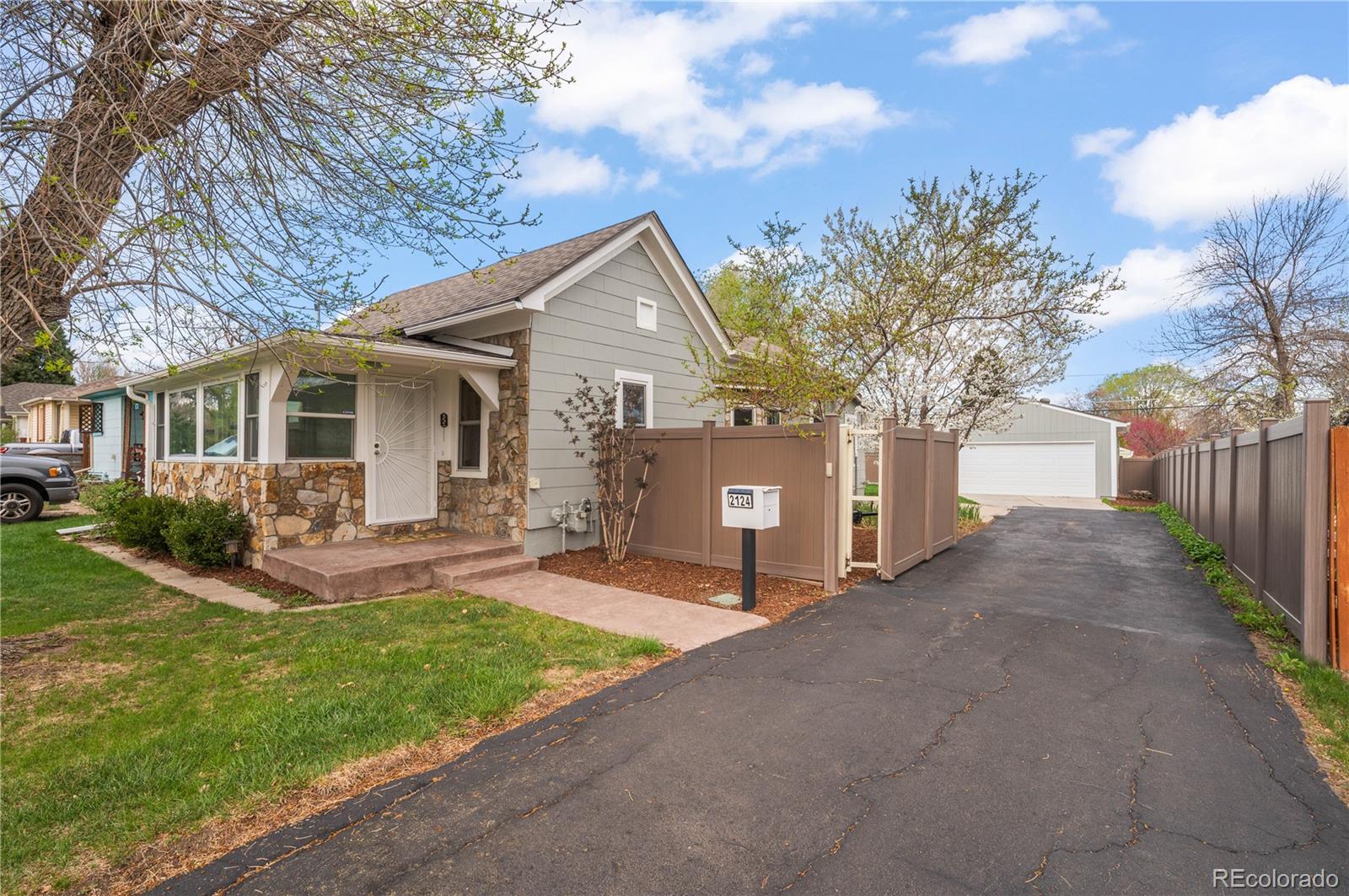 2124 Gray Street Edgewater, CO 80214 - Photo 2 of 49 a view of a house with backyard and a tree