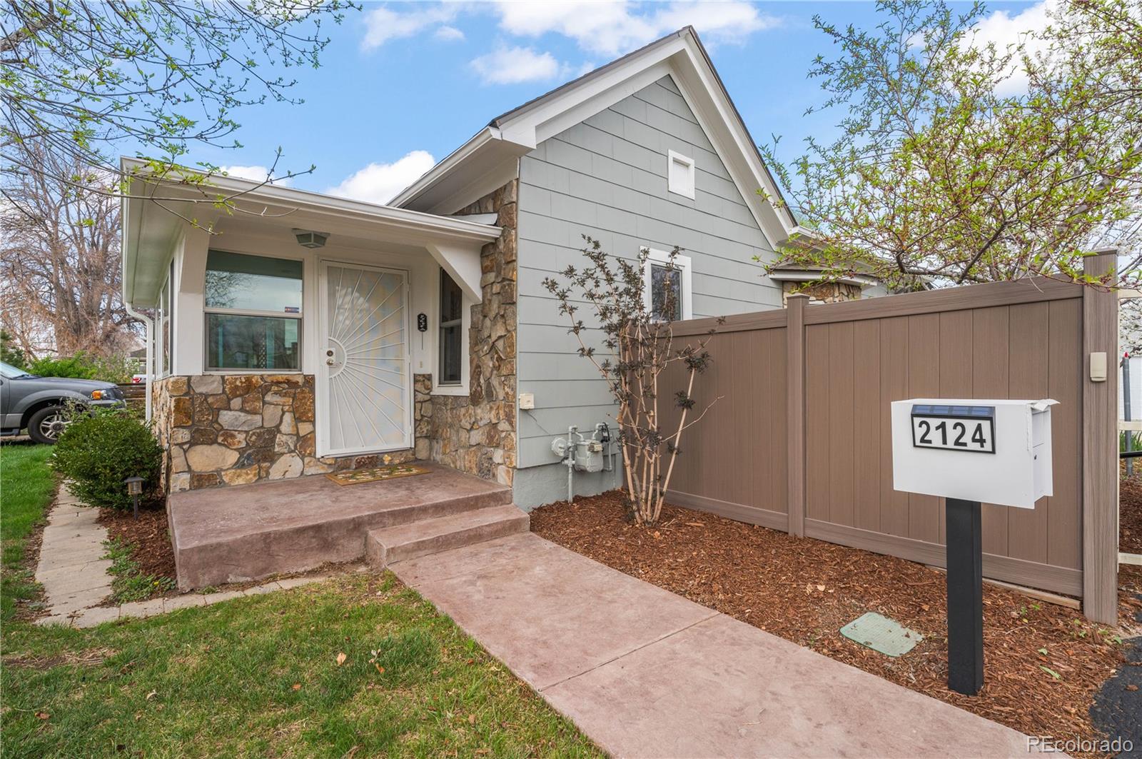 2124 Gray Street Edgewater, CO 80214 - Photo 4 of 49 a view of a house with a yard and plants