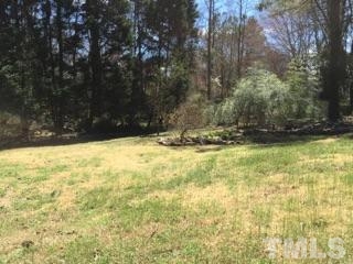 7104 Mill Ridge Road Raleigh, NC 27613 - Photo 2 of 4 a view of yard with swimming pool