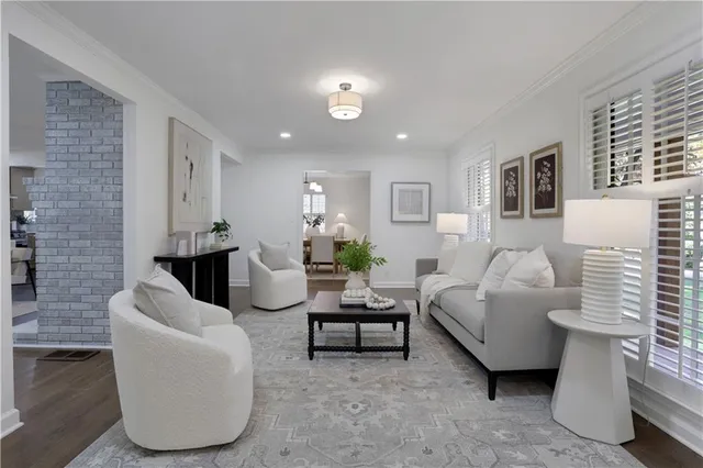 a kitchen with stainless steel appliances a sink stove and cabinets