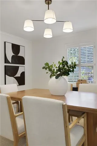 a bathroom with a mirror sink and vanity