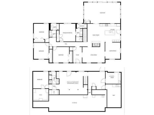 a kitchen with a table chairs microwave and cabinets