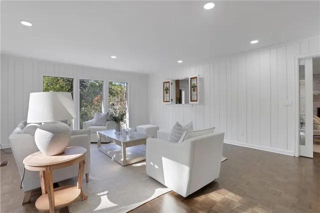 a bedroom with a bed and a table