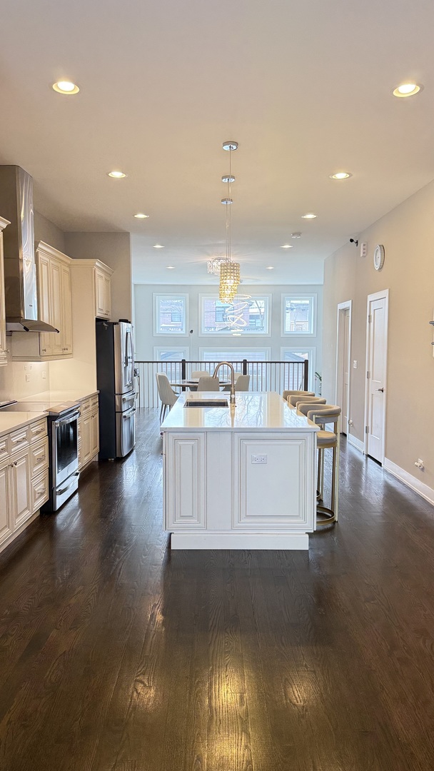 3422 South Normal Avenue Chicago, IL 60616 - Photo 11 of 48 a view of kitchen with stainless steel appliances granite countertop lots of counter top space