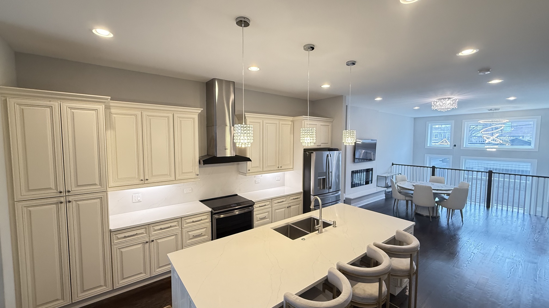 3422 South Normal Avenue Chicago, IL 60616 - Photo 13 of 48 a kitchen with kitchen island a stove a table and chairs in it
