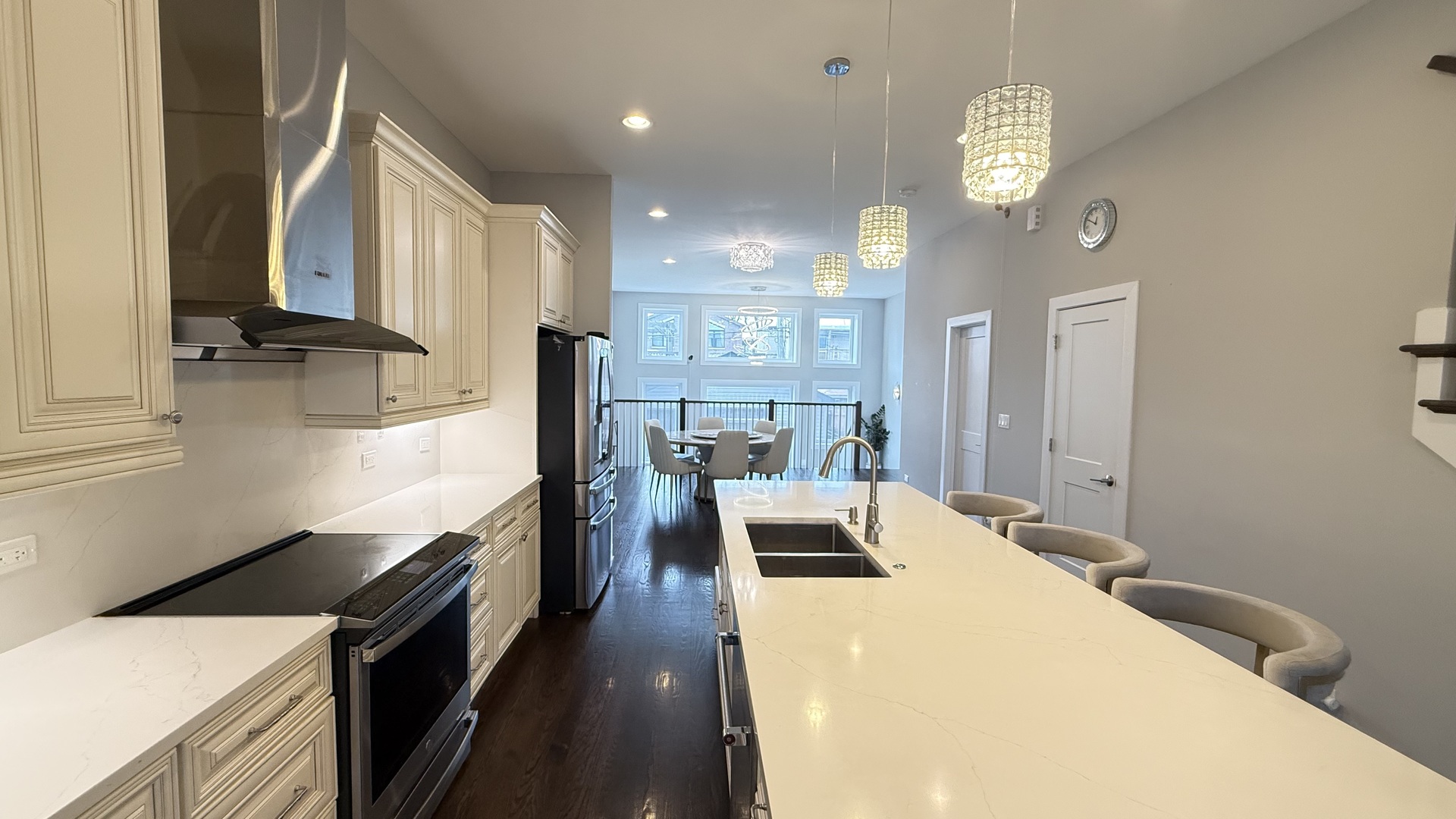 3422 South Normal Avenue Chicago, IL 60616 - Photo 14 of 48 a kitchen with a stove a refrigerator and a view of living room