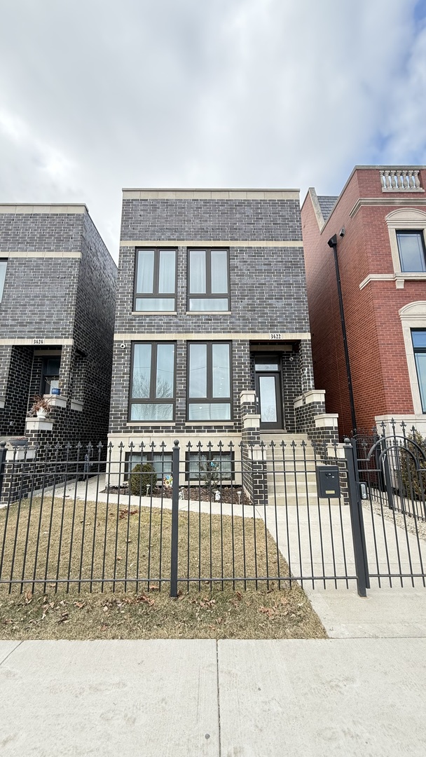 3422 South Normal Avenue Chicago, IL 60616 - Photo 2 of 48 a front view of a house