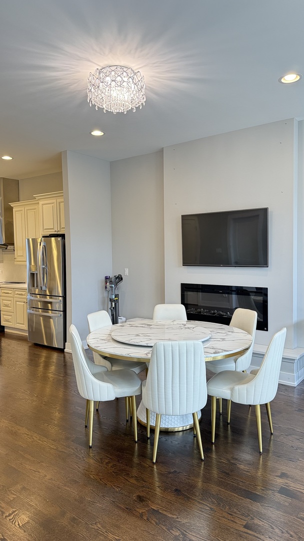 3422 South Normal Avenue Chicago, IL 60616 - Photo 21 of 48 a view of a dining room with furniture and wooden floor