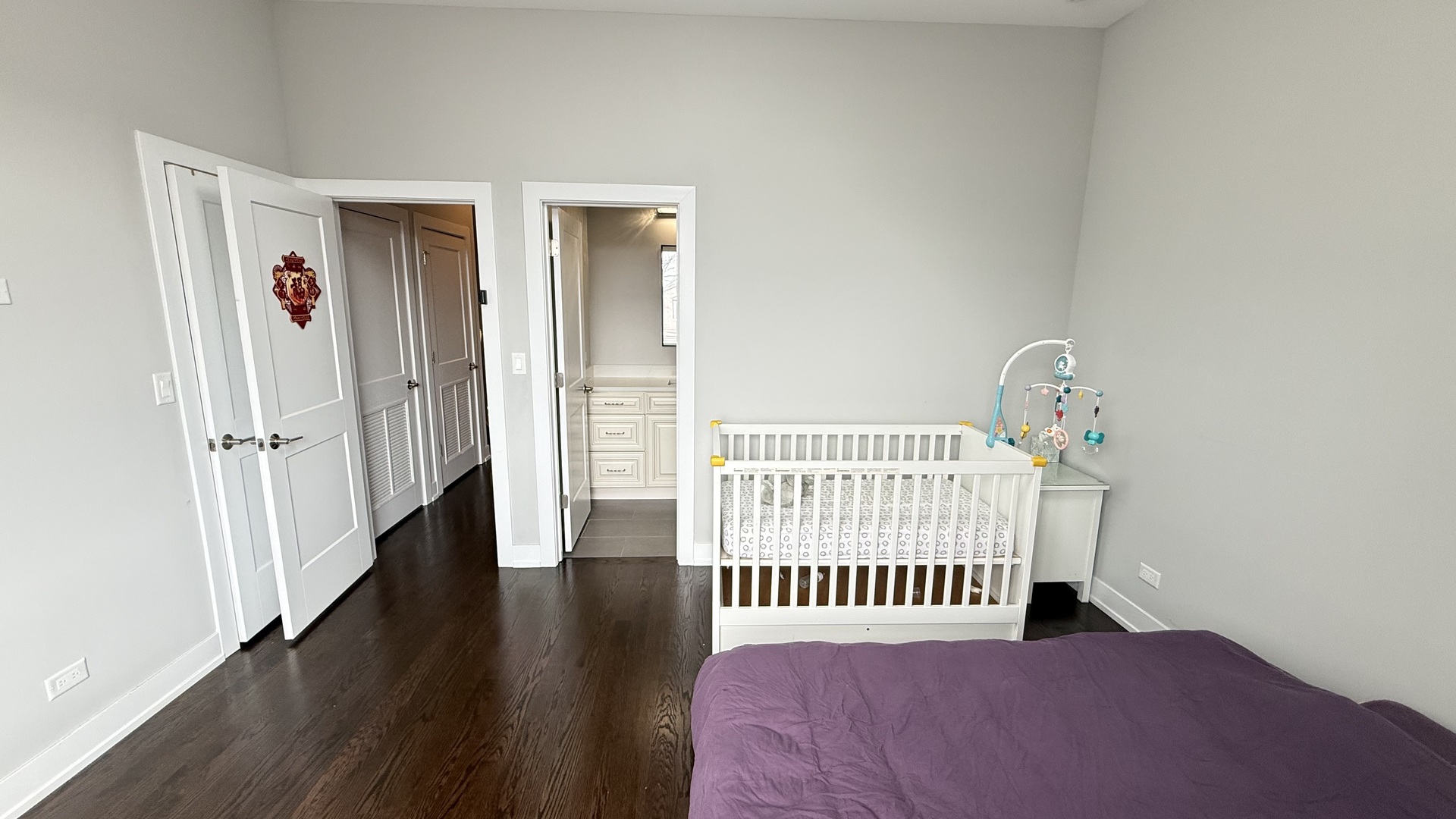 3422 South Normal Avenue Chicago, IL 60616 - Photo 30 of 48 a bedroom with a bed and wooden floor