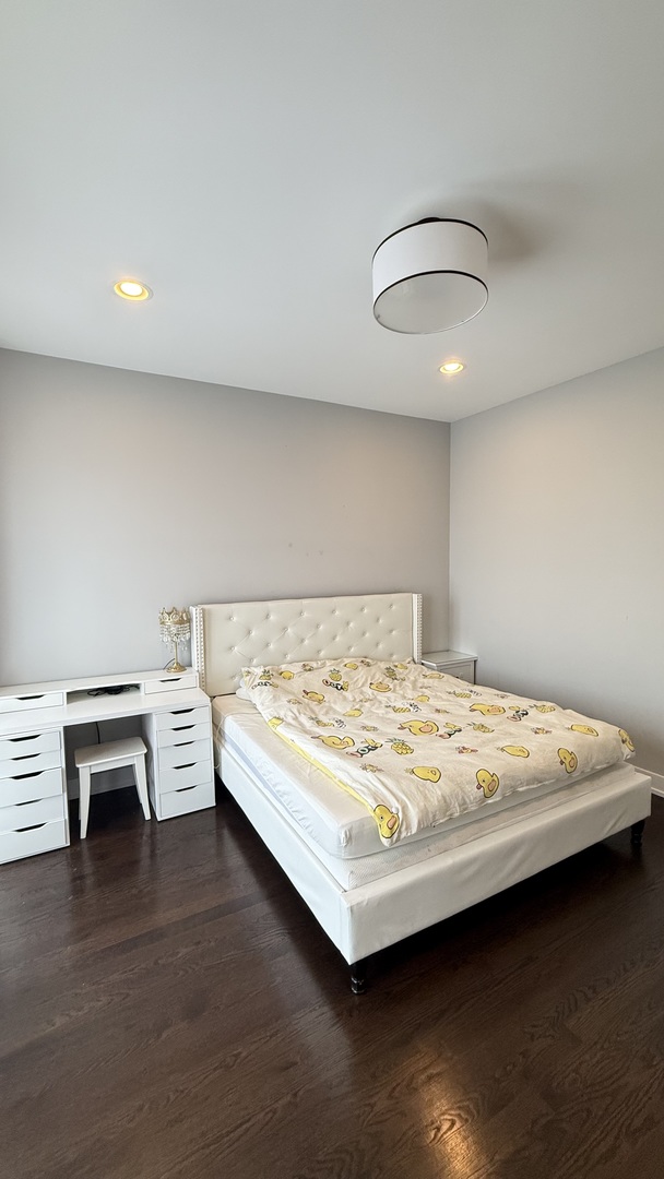 3422 South Normal Avenue Chicago, IL 60616 - Photo 32 of 48 a bedroom with a bed and a desk
