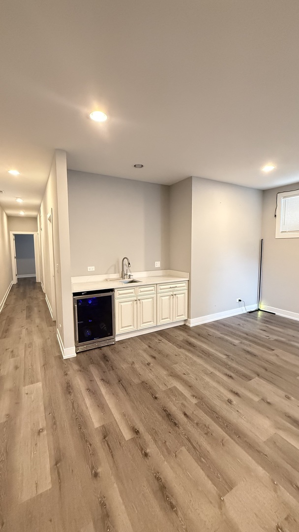 3422 South Normal Avenue Chicago, IL 60616 - Photo 36 of 48 a view of an empty room with a kitchen