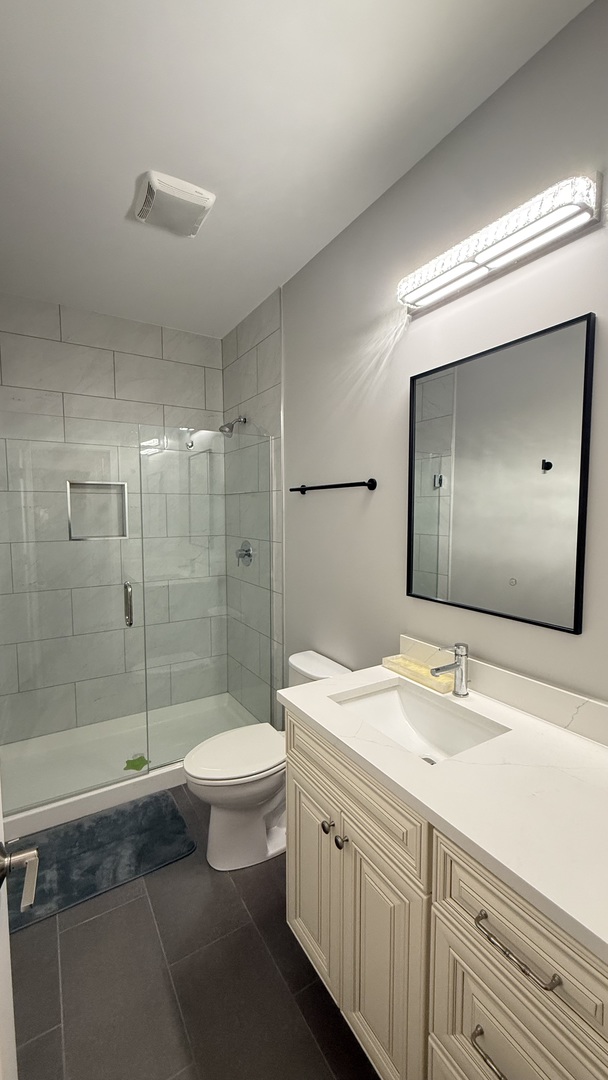 3422 South Normal Avenue Chicago, IL 60616 - Photo 38 of 48 a bathroom with a sink a toilet and shower