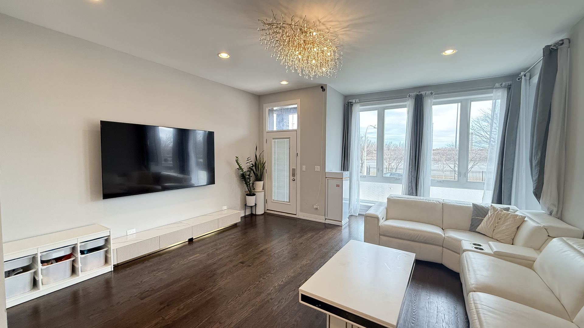 3422 South Normal Avenue Chicago, IL 60616 - Photo 6 of 48 a living room with furniture and a flat screen tv