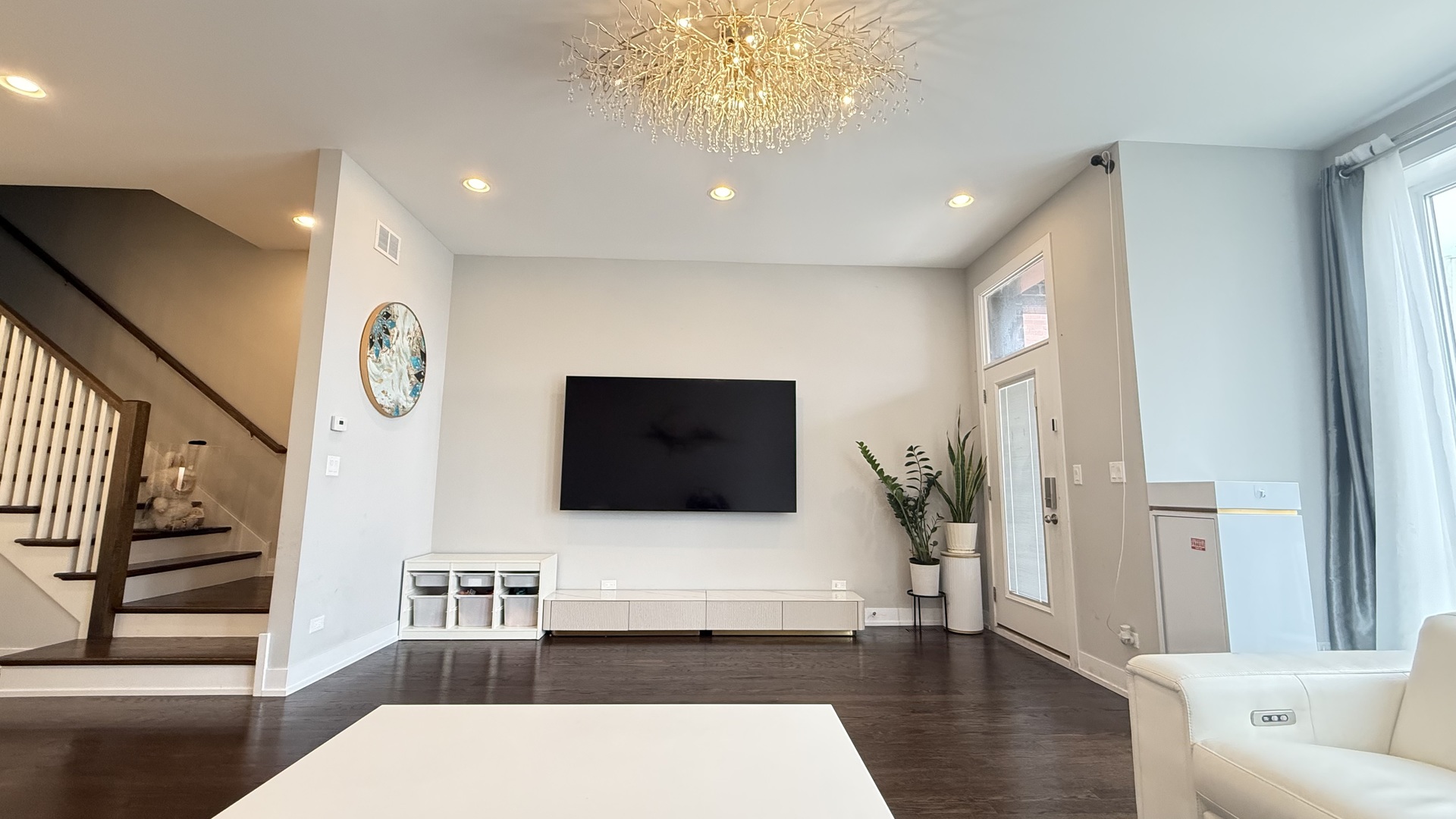3422 South Normal Avenue Chicago, IL 60616 - Photo 8 of 48 a living room with furniture and a flat screen tv