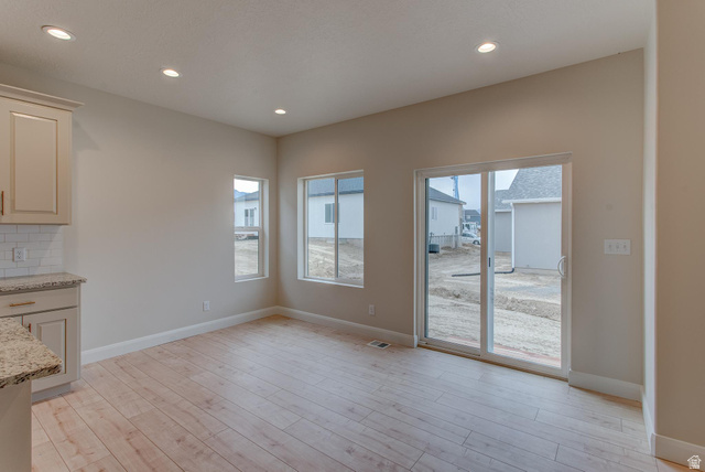 1512 West 600 North, Unit O4A Mapleton, UT 84664 - Photo 5 of 24 Unfurnished dining area featuring healthy amount of natural light, light wood-style flooring, and recessed lighting