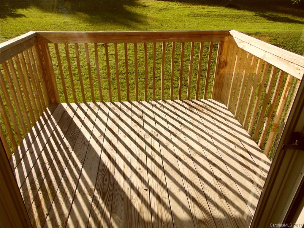 4184 State Rd S-29-304, Unit 2 Lancaster, SC 29720 - Photo 11 of 14 a balcony with a outdoor space
