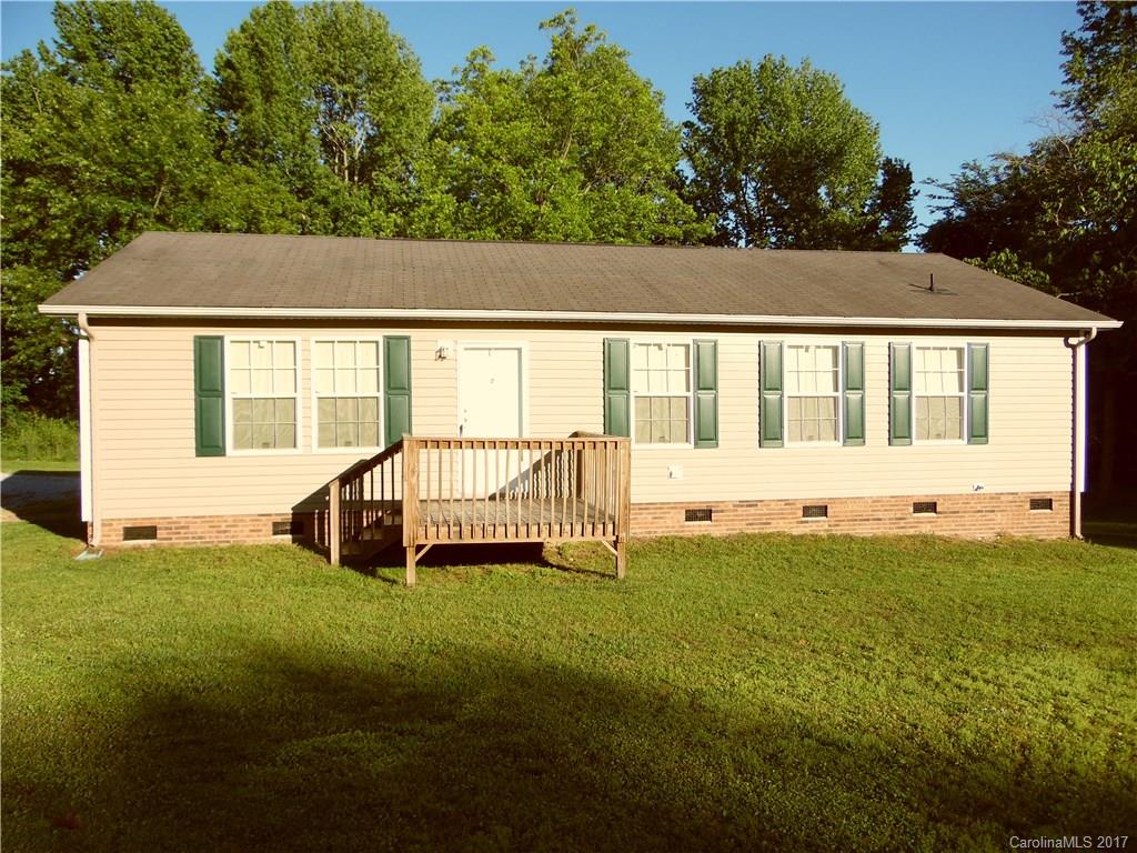 4184 State Rd S-29-304, Unit 2 Lancaster, SC 29720 - Photo 12 of 14 a view of a house with pool and yard
