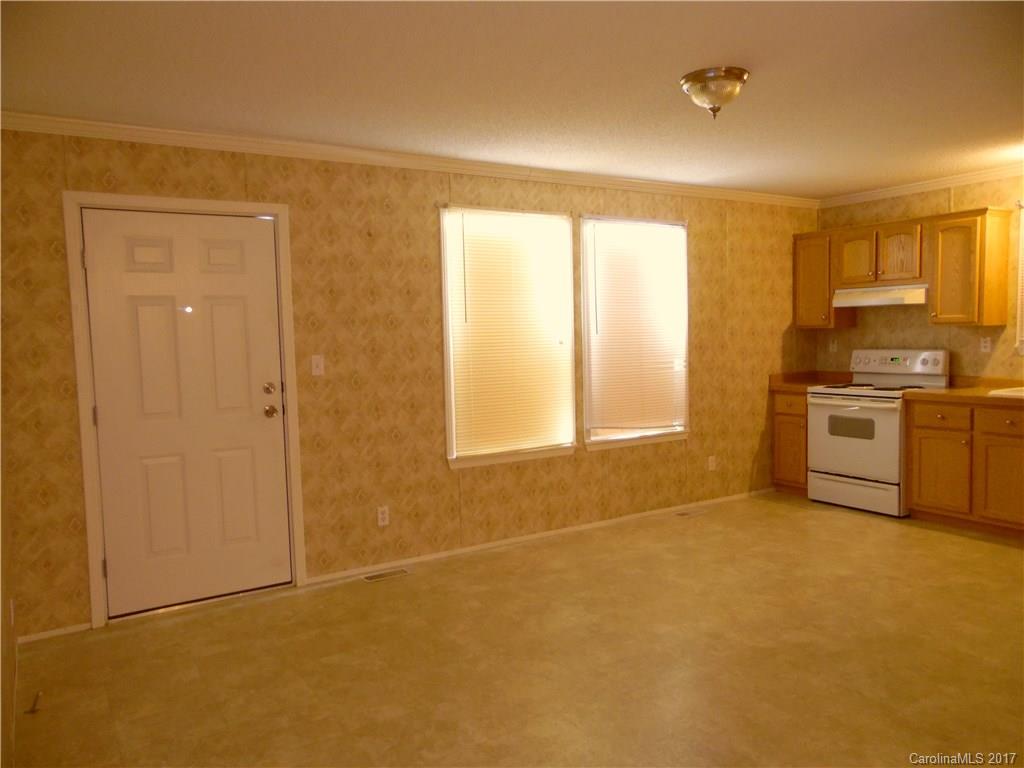 4184 State Rd S-29-304, Unit 2 Lancaster, SC 29720 - Photo 3 of 14 a view of an empty room with a window