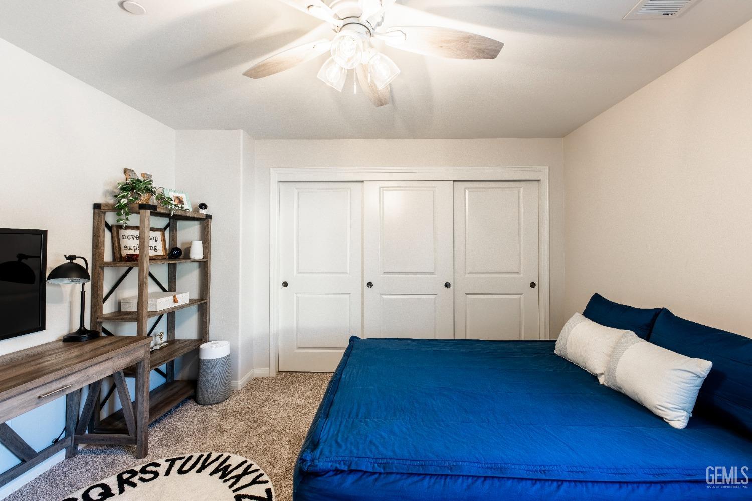 Undisclosed Address Bakersfield, CA 93312 - Photo 24 of 43 a view of bedroom with furniture and wooden floor