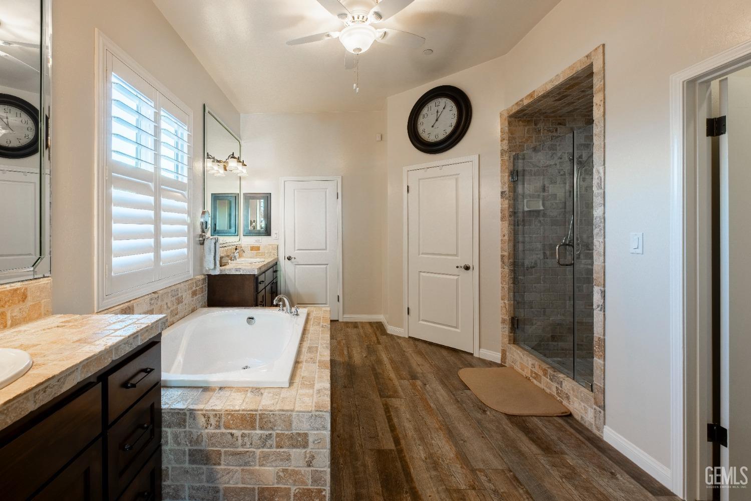 Undisclosed Address Bakersfield, CA 93312 - Photo 29 of 43 a view of a kitchen area with furniture wooden floor and window